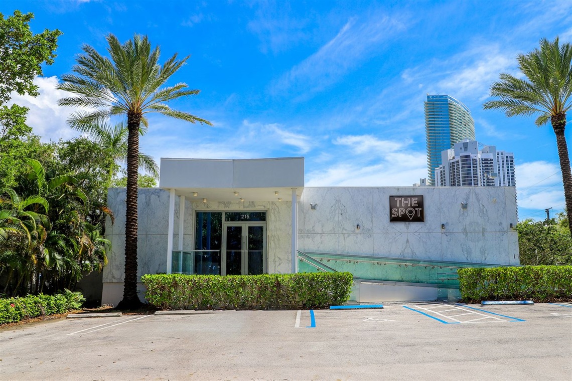 The Spot - Front with Sign The Spot - Front with Sign